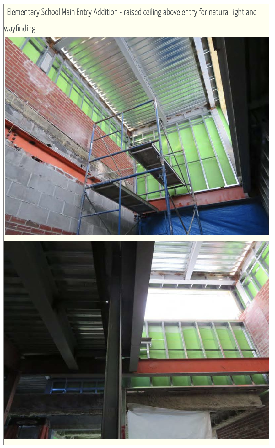 Elementary school main entry addition - raised ceiling above every entry for natural  light and wayfiding